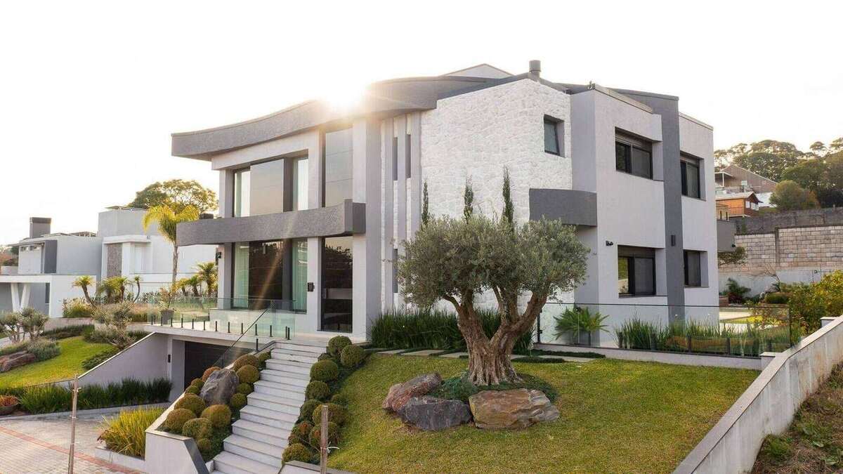 Casa MM integrada ao jardim, projetada e executada pela Treviso